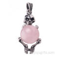 Ожерелье из натурального розового кварца с серебряным черепом